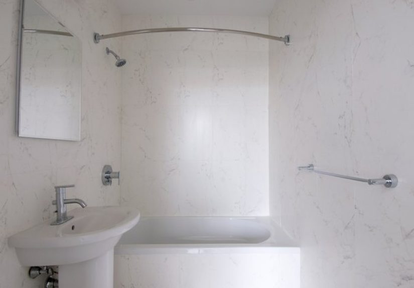 How to Put Wall Trim Around a One-Piece Tub & Shower