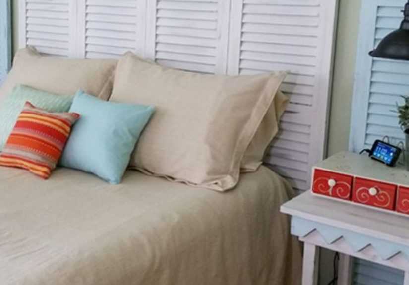 Garage Sale Shutters Turned Headboard!