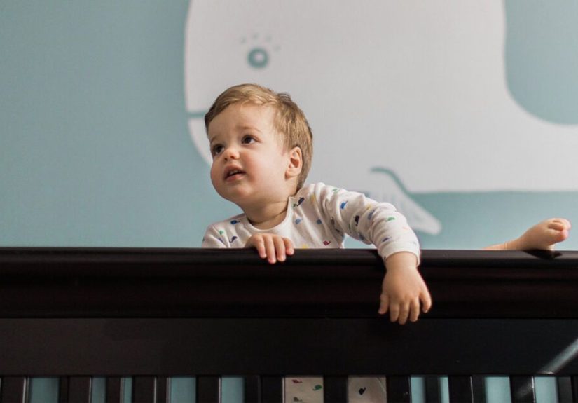 Toddler Climbing Out of Crib? Solutions and Preventing Falls