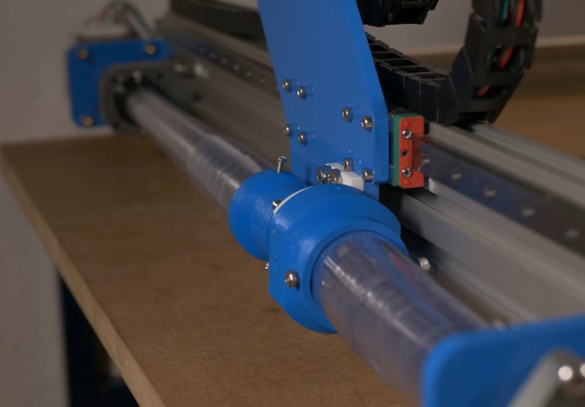Plastic Strips Protect Ball Screws On This Homebrew CNC Router